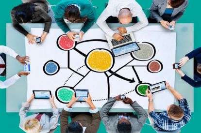 students-sharing-data-using-mobile-devices