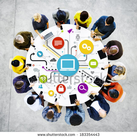 stock-photo-group-of-multi-ethnic-people-working-on-digital-devices-around-table-183354443