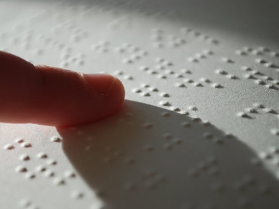 2019-07-15-closeup-person-reading-braille-cc-by-stefan-malmesjocc88-600x450