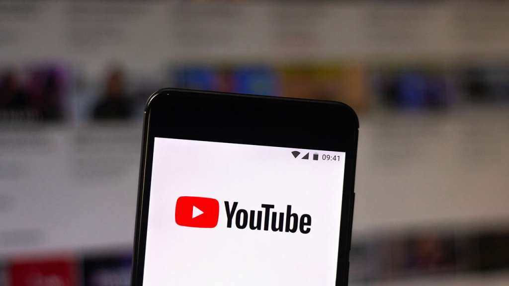 In this photo illustration the Youtube logo seen displayed