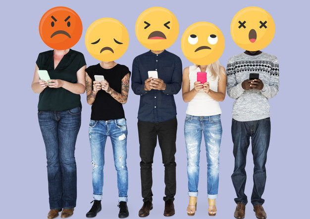 Diverse people with emoticons using mobile phones