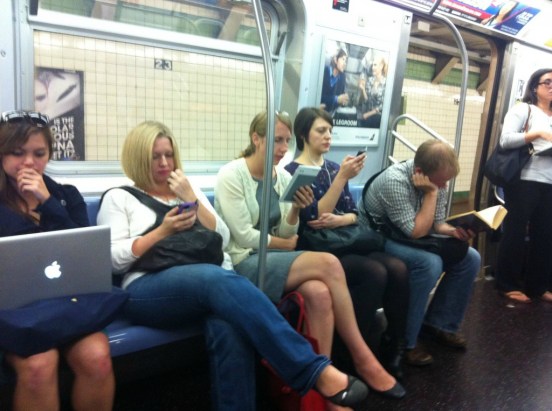 reading-books-ebooks-ipad-on-subway-1024x764-1